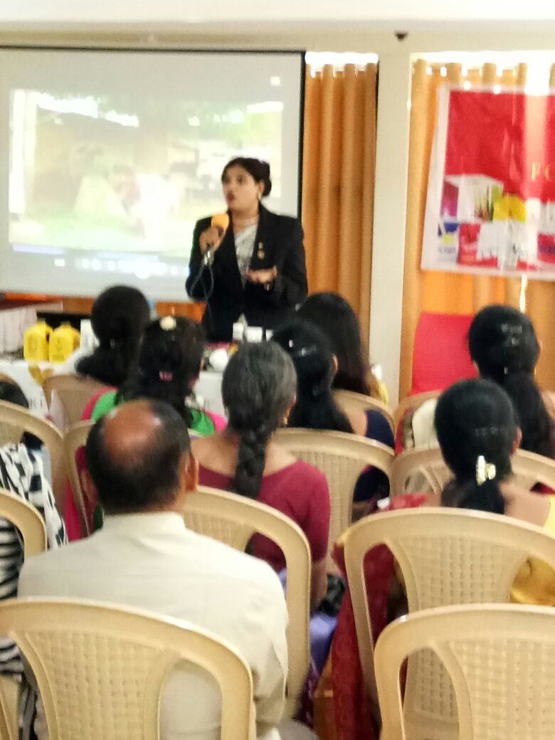 An interactive presentation with a seated audience.